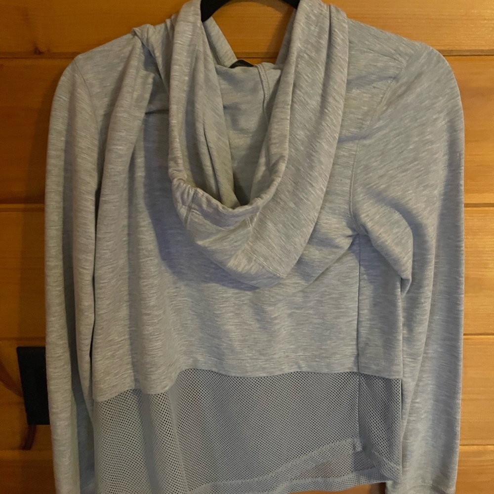 Like new cropped sweatshirt mesh material on bottom half.